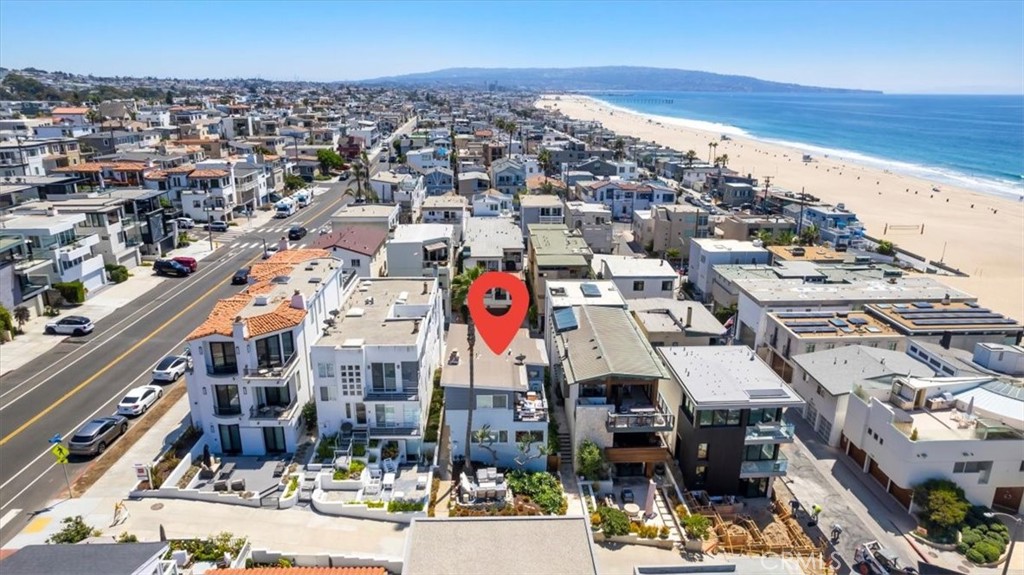 124 2nd Street Manhattan Beach, CA 90266 - Photo 8 of 11 an aerial view of multi story residential apartment building with parking space