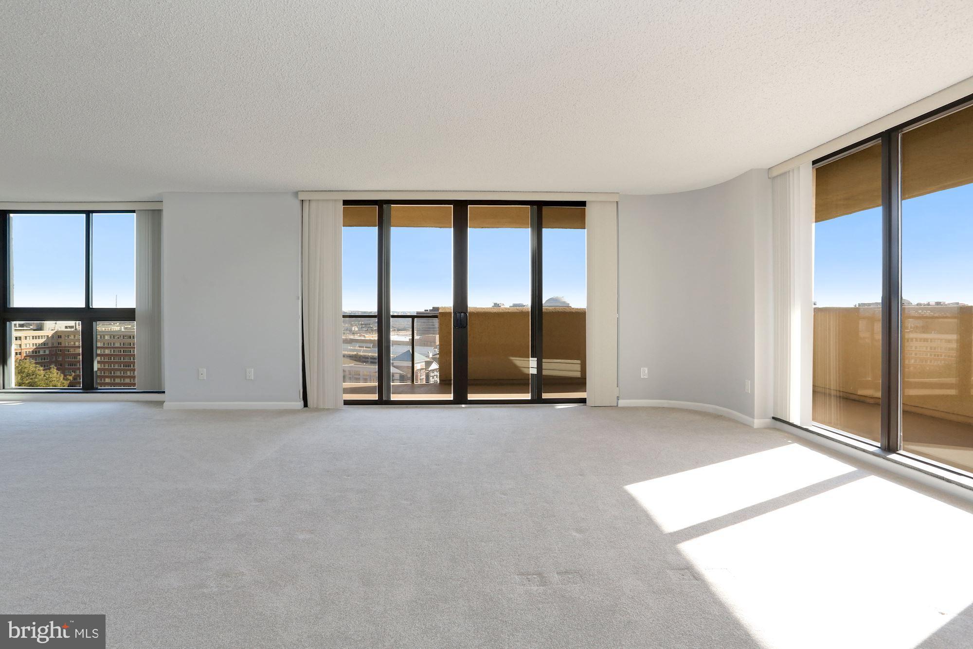 1101 South Arlington Ridge Road, Unit 902 Arlington, VA 22202 - Photo 16 of 38 an empty room with windows