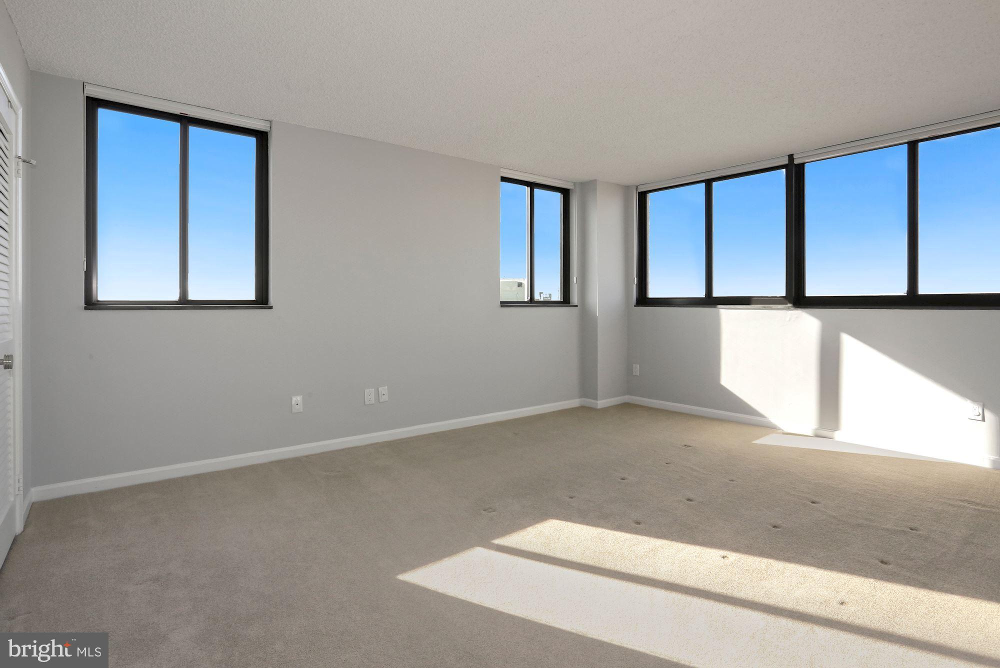 1101 South Arlington Ridge Road, Unit 902 Arlington, VA 22202 - Photo 20 of 38 a view of an empty room with a window