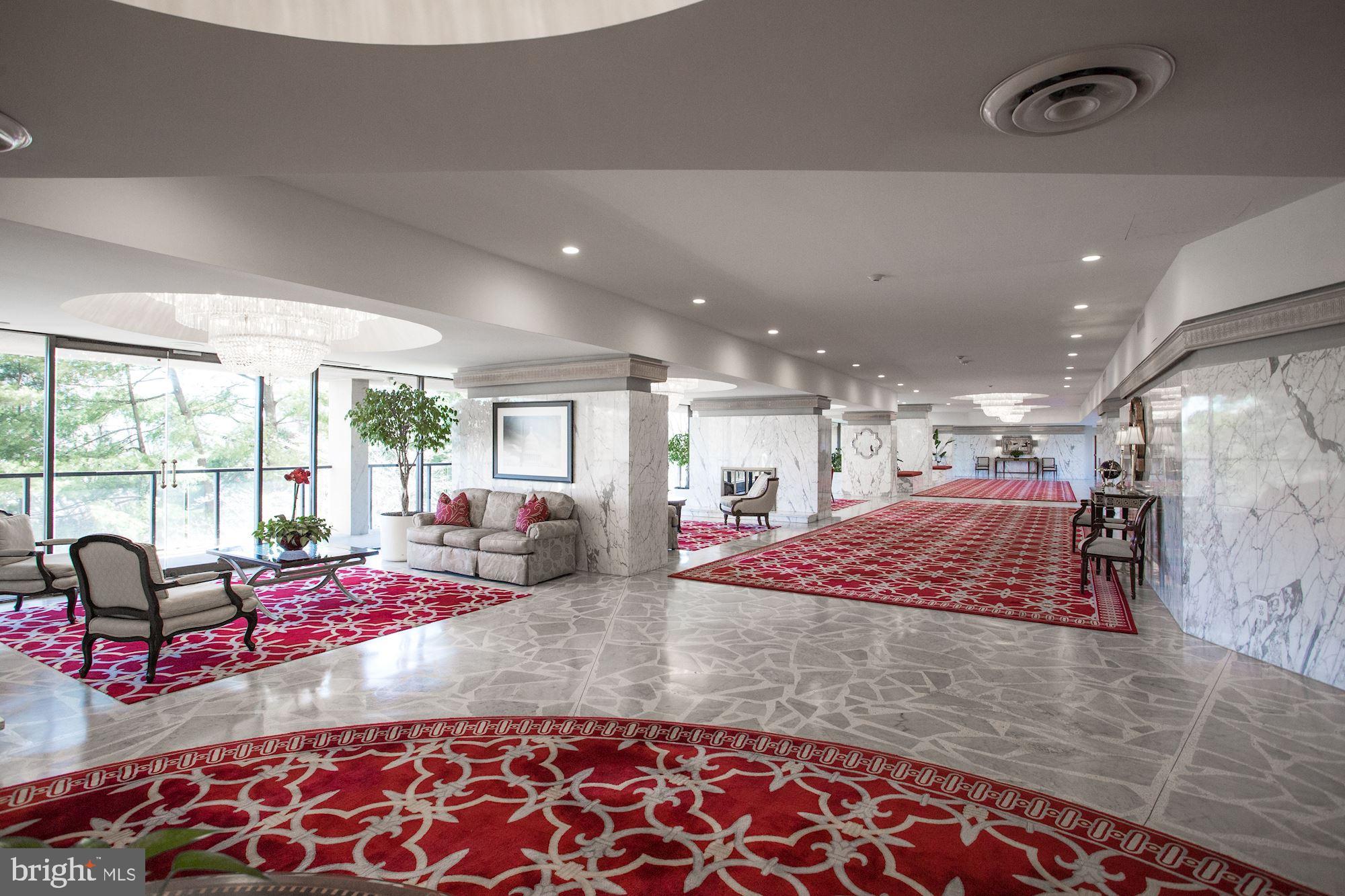 1101 South Arlington Ridge Road, Unit 902 Arlington, VA 22202 - Photo 4 of 38 a room with lots of gym equipment