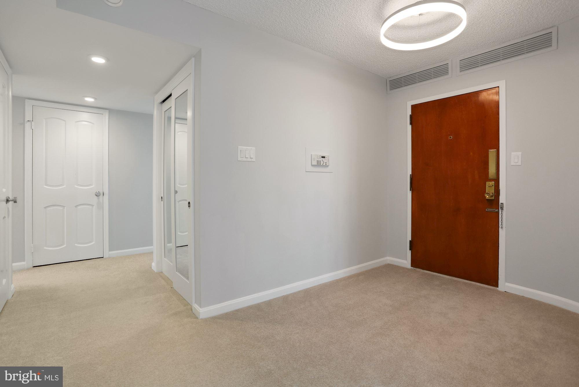 1101 South Arlington Ridge Road, Unit 902 Arlington, VA 22202 - Photo 6 of 38 a view of an empty room