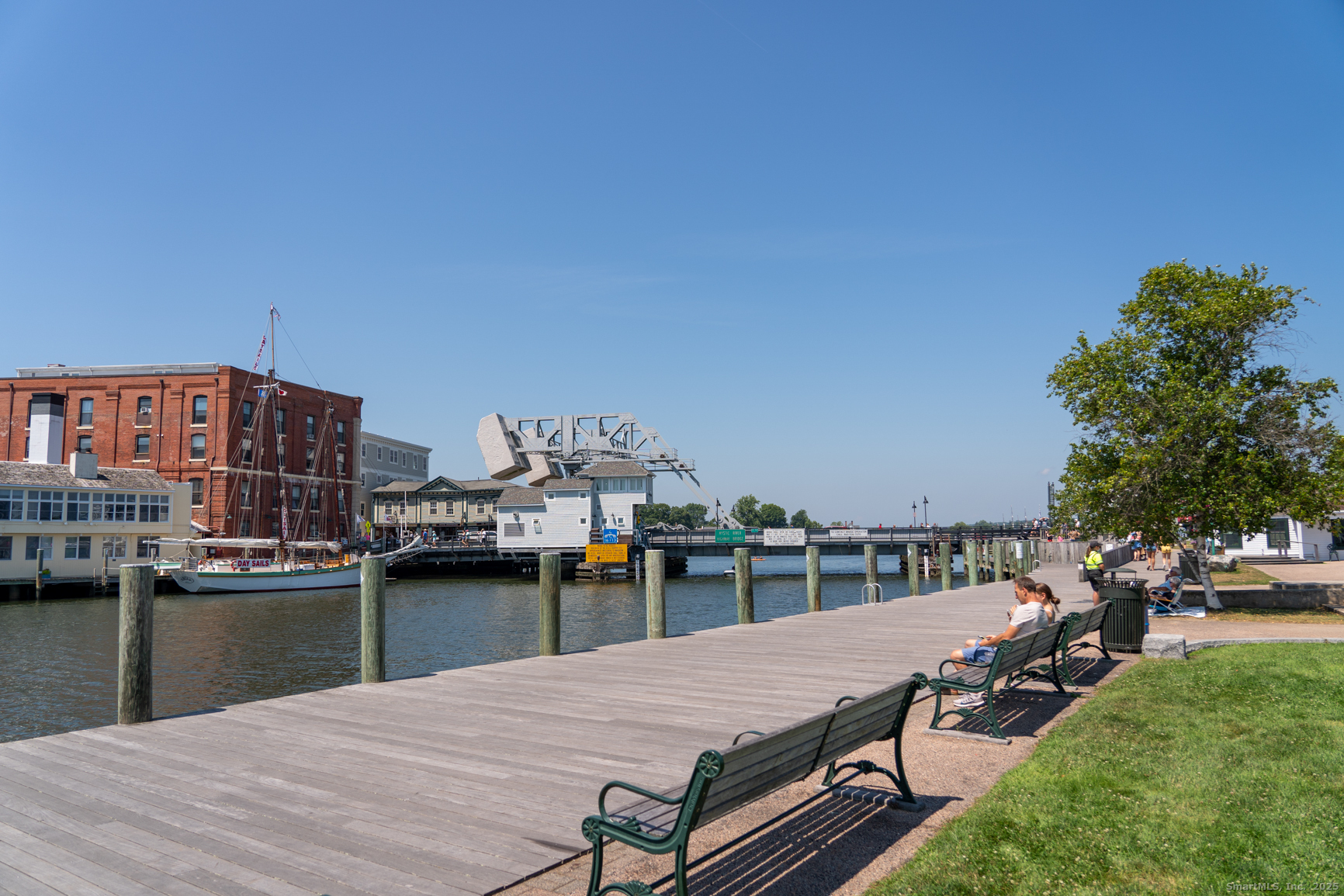 60 Willow Street, Unit 305 Stonington, CT 06355 - Photo 18 of 21 a view of a terrace with chairs