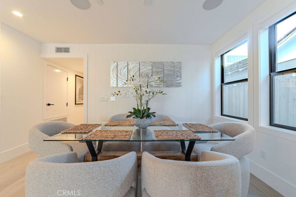 603 Acacia Avenue, Unit A Corona del Mar, CA 92625 - Photo 17 of 53 a living room with furniture and a potted plant