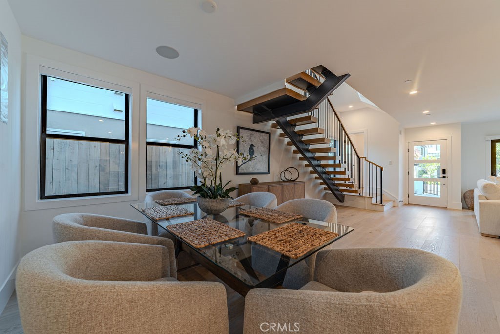 603 Acacia Avenue, Unit A Corona del Mar, CA 92625 - Photo 21 of 53 a living room with furniture and wooden floor