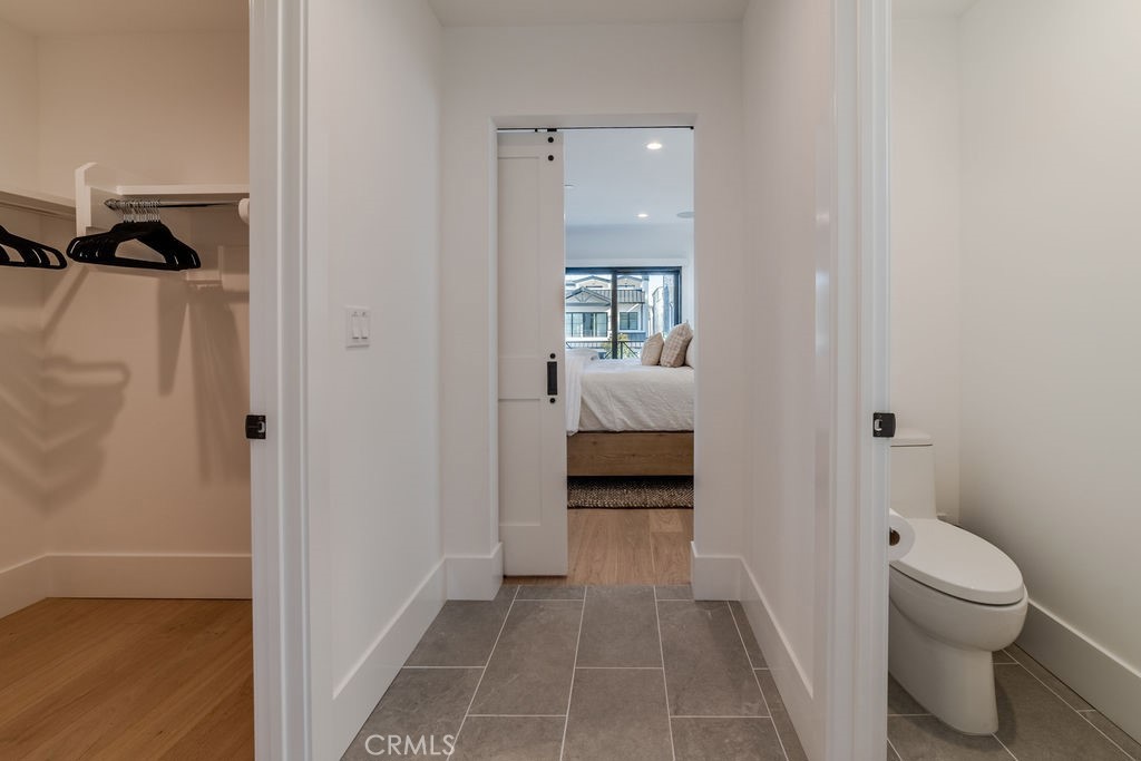 603 Acacia Avenue, Unit A Corona del Mar, CA 92625 - Photo 33 of 53 a bathroom with a sink and a toilet