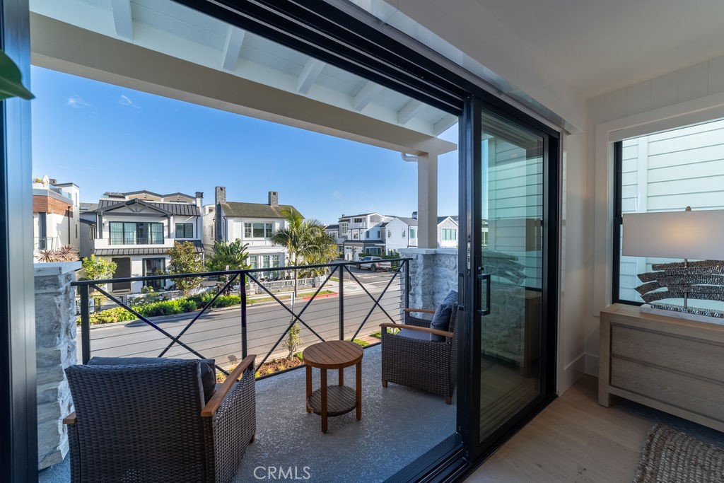 603 Acacia Avenue, Unit A Corona del Mar, CA 92625 - Photo 38 of 53 a view of a balcony with chairs
