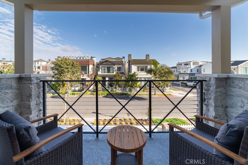 603 Acacia Avenue, Unit A Corona del Mar, CA 92625 - Photo 39 of 53 a view of a balcony with chairs