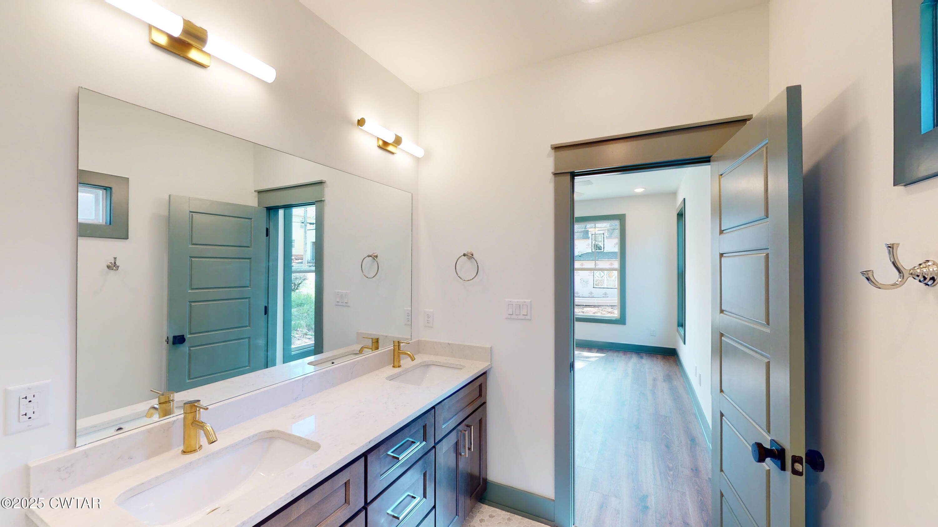 205 McCowat Street Jackson, TN 38301 - Photo 14 of 23 a bathroom with a sink vanity granite tub and shower