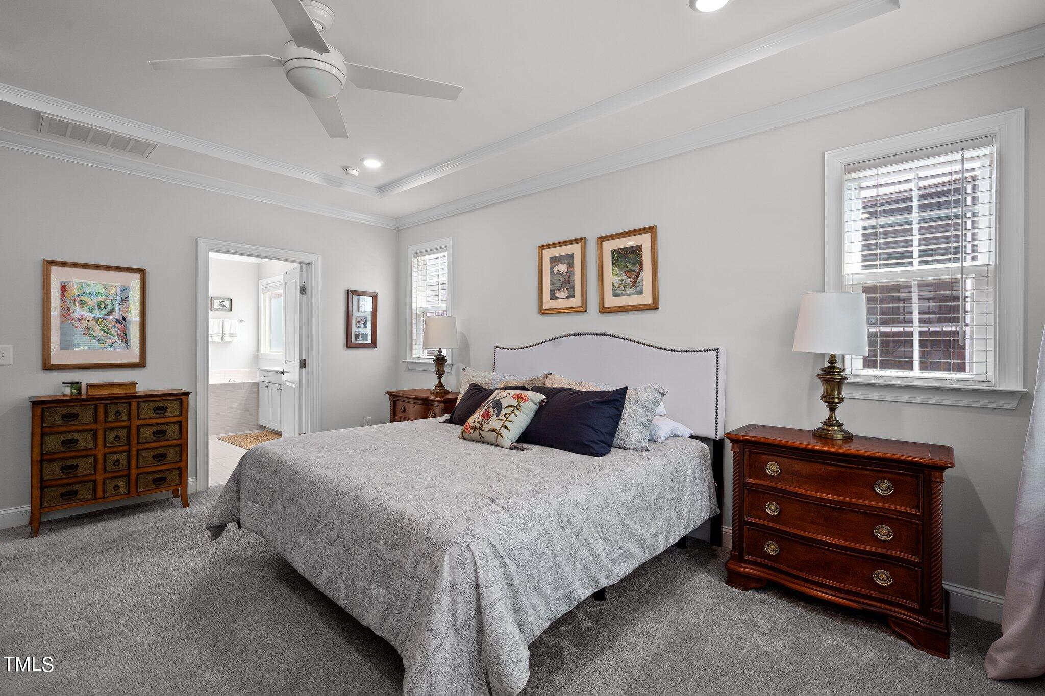 229 Ivory Lane Raleigh, NC 27610 - Photo 18 of 46 a bedroom with a bed and a window