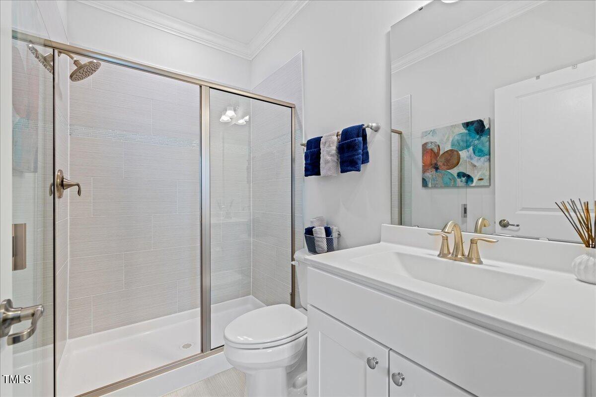 229 Ivory Lane Raleigh, NC 27610 - Photo 24 of 46 a bathroom with a sink toilet and shower