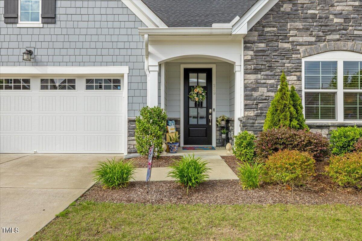 229 Ivory Lane Raleigh, NC 27610 - Photo 3 of 46 a front view of a building