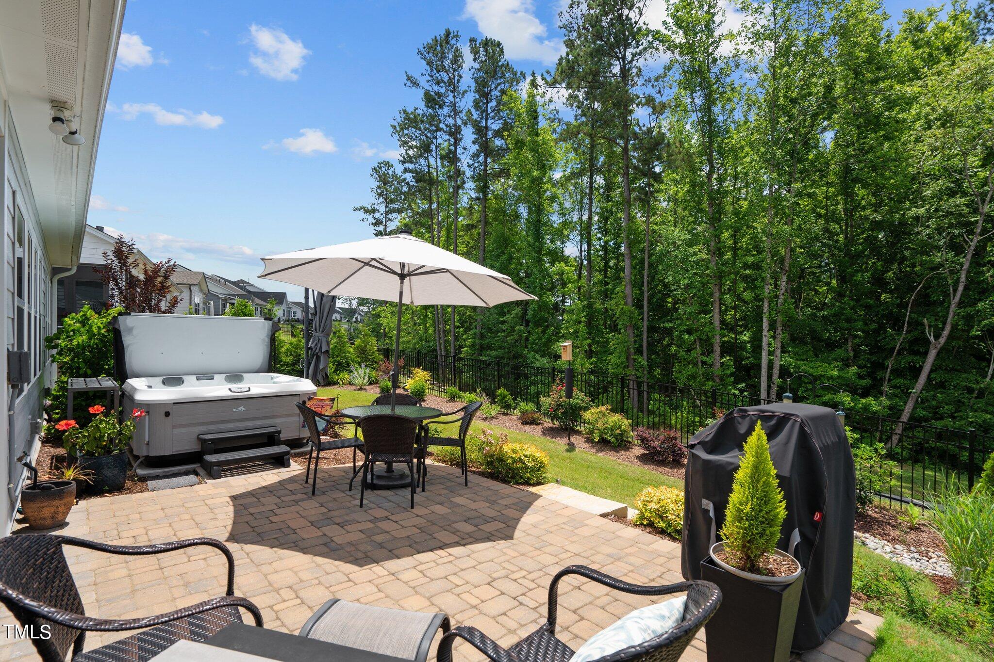229 Ivory Lane Raleigh, NC 27610 - Photo 32 of 46 a view of a backyard with furniture and outdoor seating