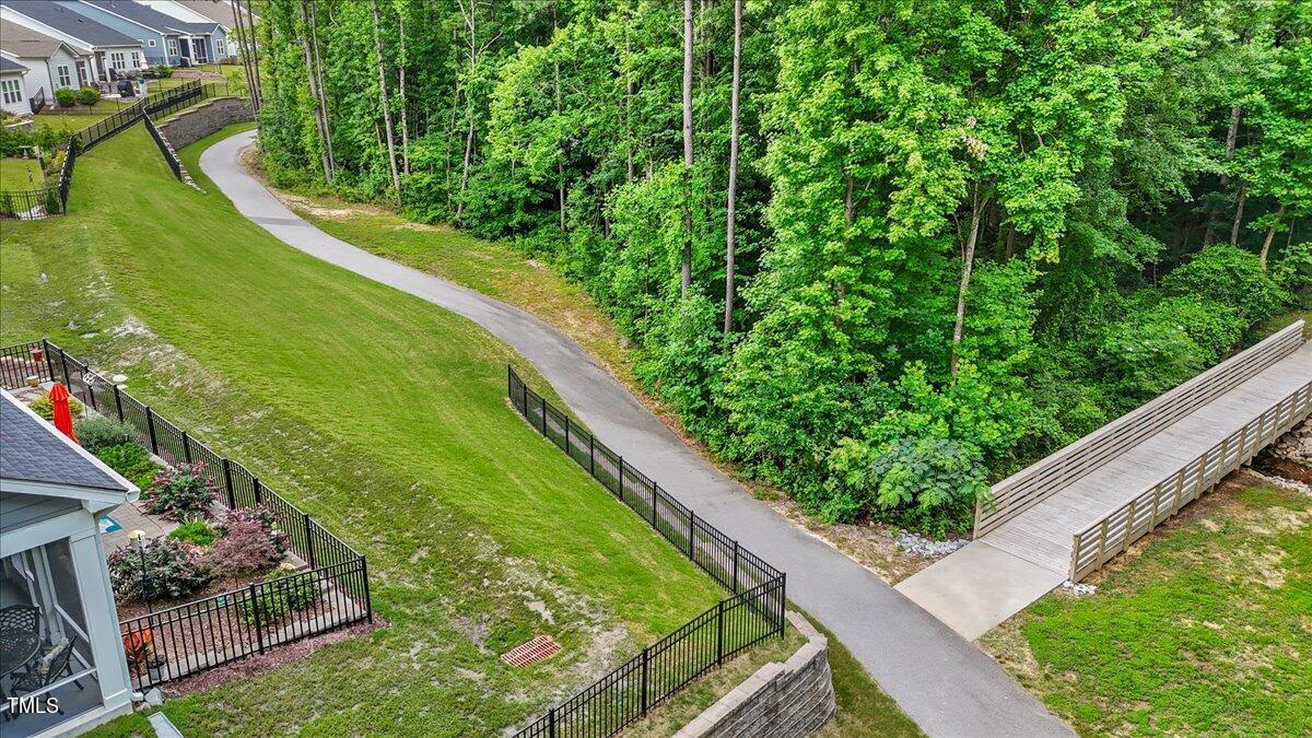 229 Ivory Lane Raleigh, NC 27610 - Photo 38 of 46 a view of a garden from a balcony