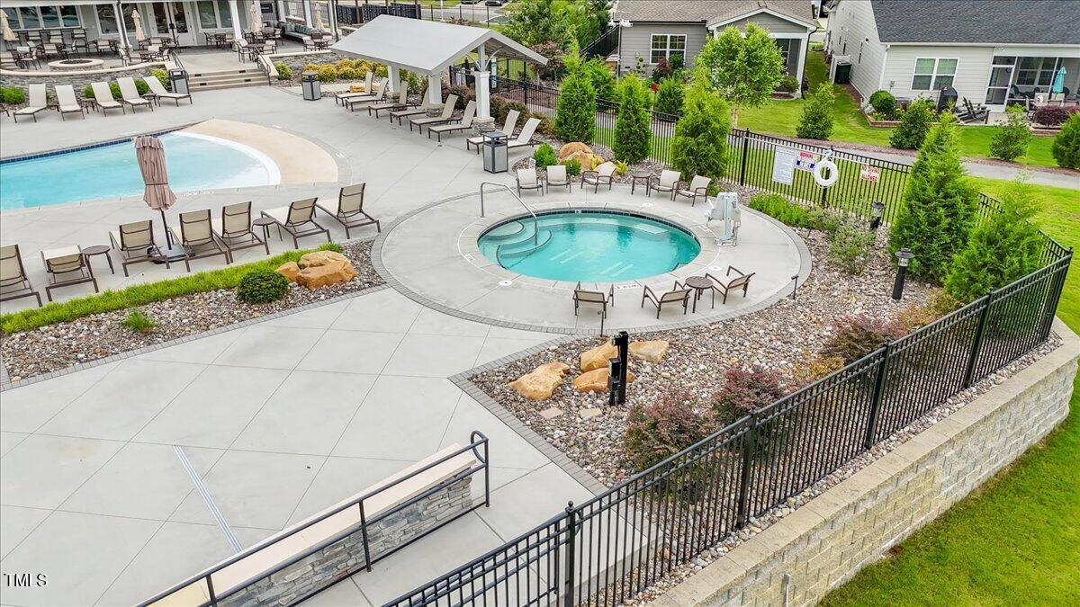 229 Ivory Lane Raleigh, NC 27610 - Photo 44 of 46 a terrace with outdoor seating and city view