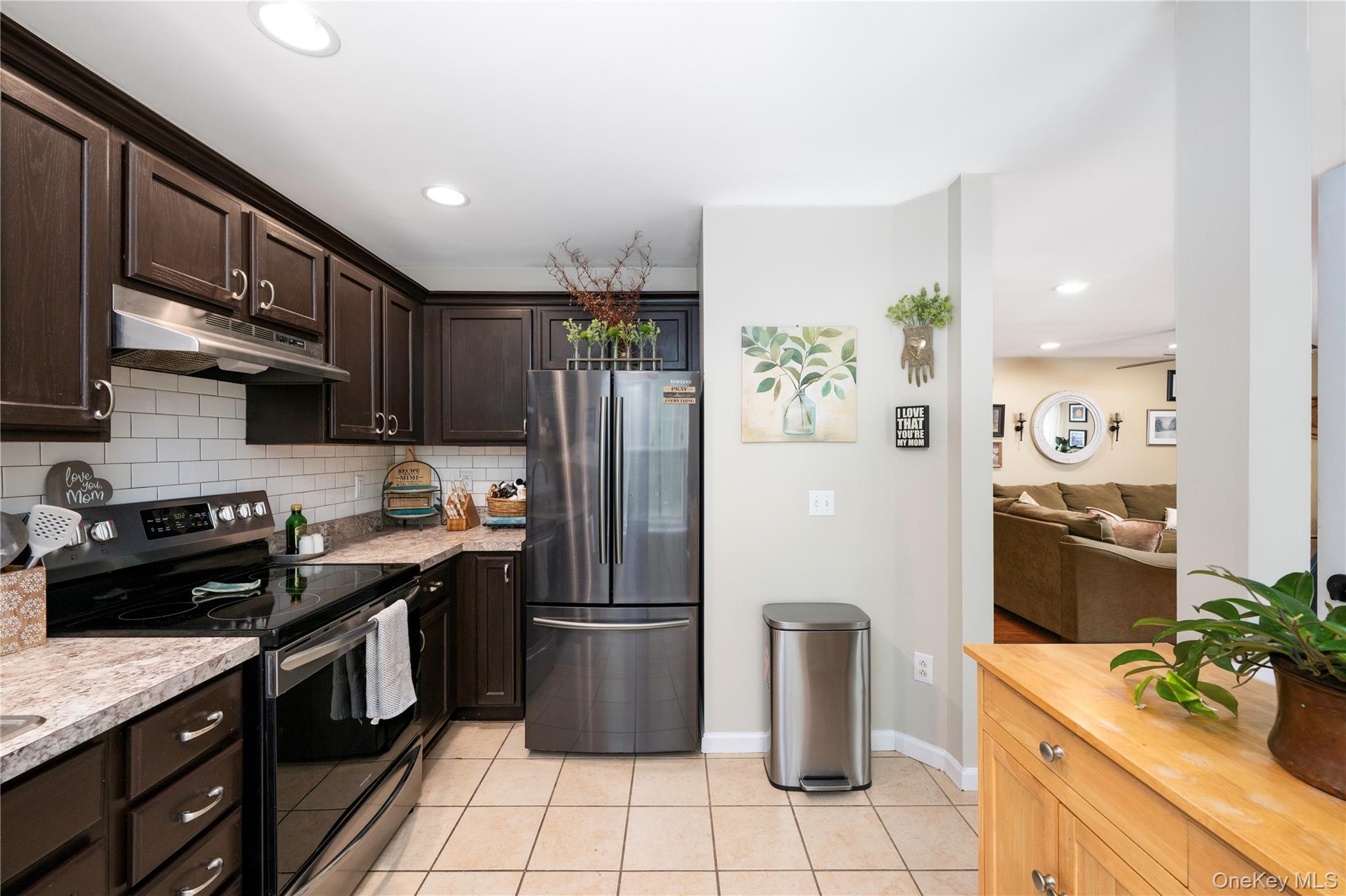 129 Stringham Road, Unit 31 LaGrangeville, NY 12540 - Photo 8 of 26 a kitchen with a refrigerator stove and sink