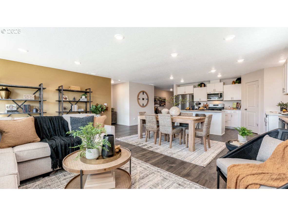 238 Greencrest Street Northeast Salem, OR 97301 - Photo 18 of 26 a living room with lots of furniture and view of kitchen