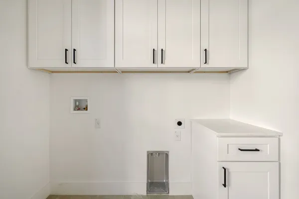 a view of cabinets and wooden floor