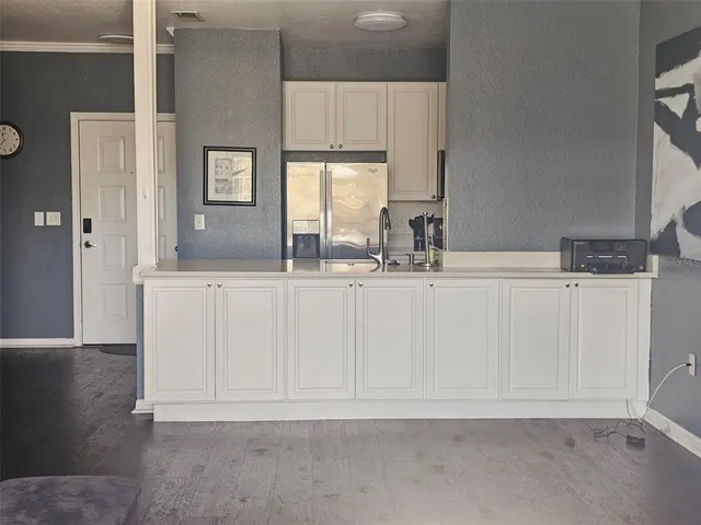 a kitchen with a stove and a microwave