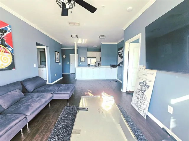 a kitchen with a sink and a mirror