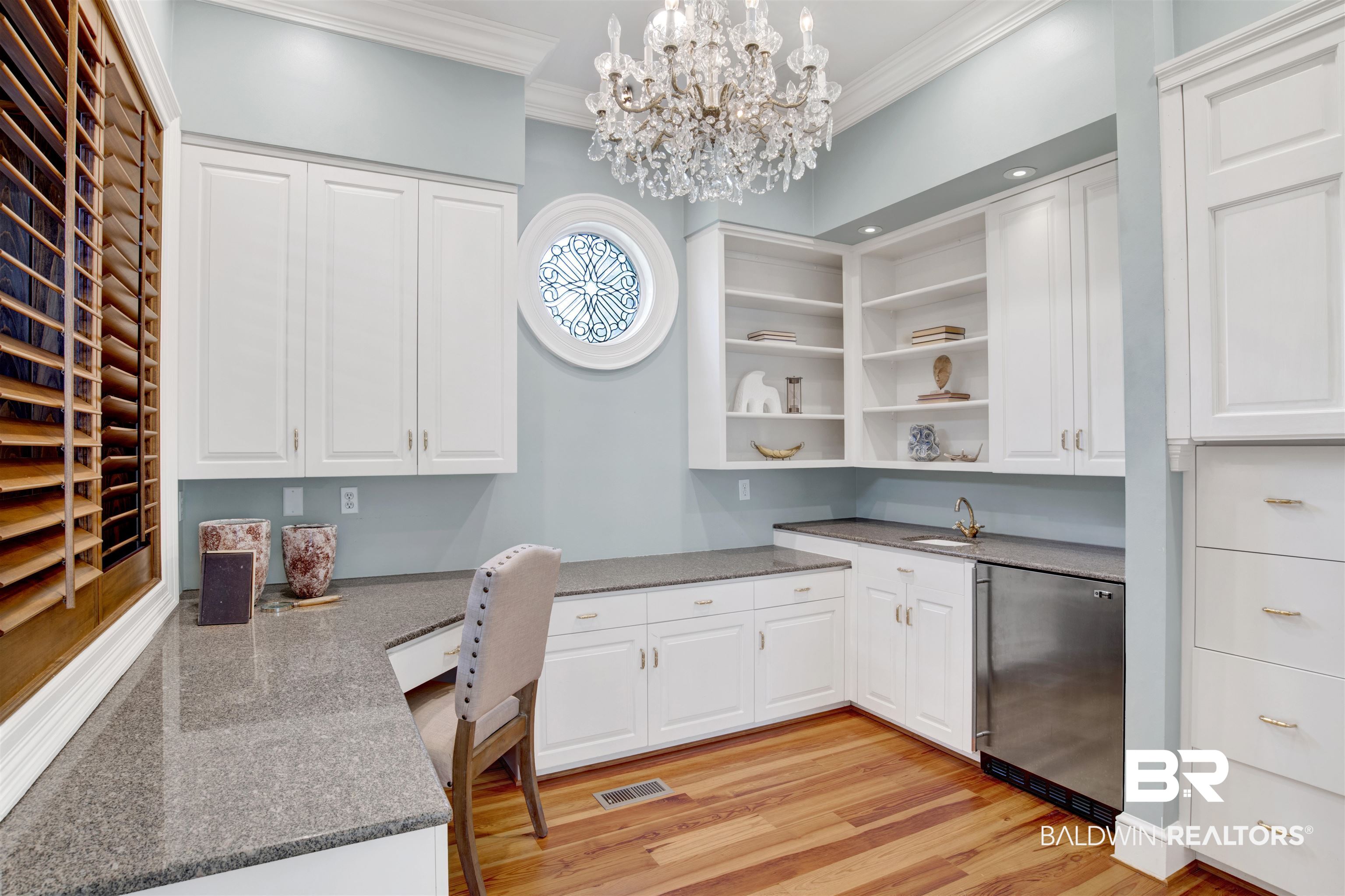 3816 Austill Lane Mobile, AL 36608 - Photo 37 of 80 Office area featuring light wood-type flooring, a chandelier, ornamental molding, and built in desk