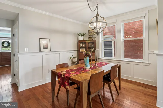 a kitchen with stainless steel appliances granite countertop a stove microwave and sink