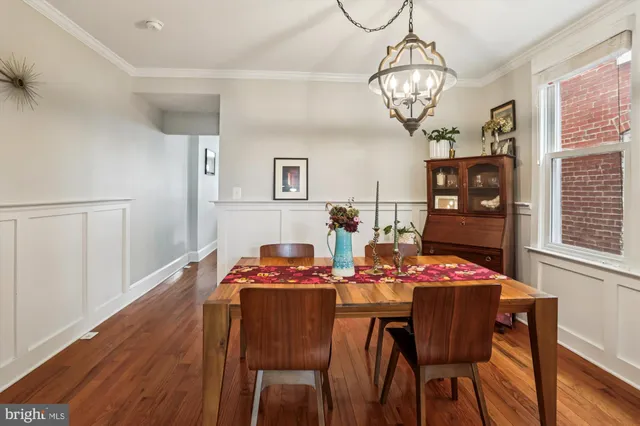 a kitchen with stainless steel appliances granite countertop a refrigerator a stove top oven a sink and dishwasher