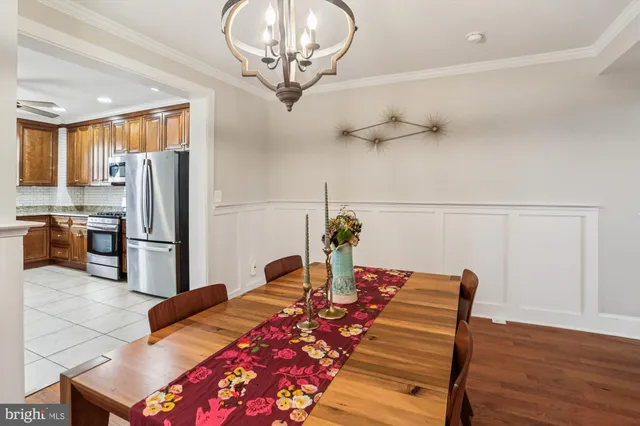 a kitchen with granite countertop a stove and a sink
