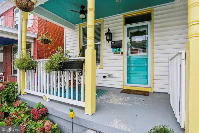 a view of a balcony with chairs