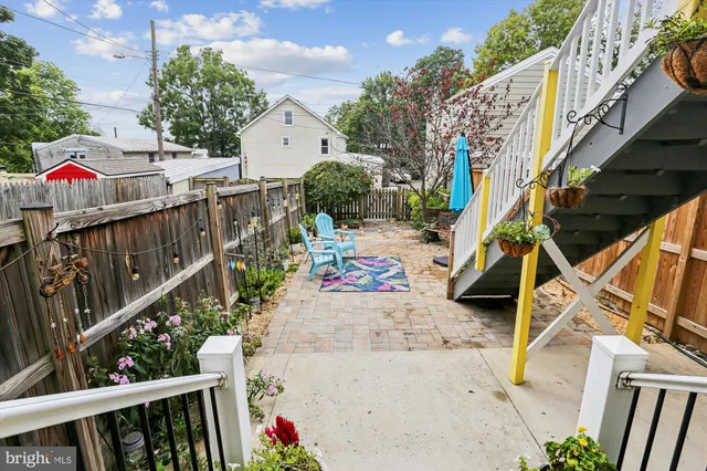 a bedroom with furniture and a book shelf