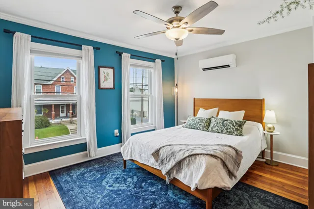 a kitchen with granite countertop a sink stainless steel appliances and cabinets