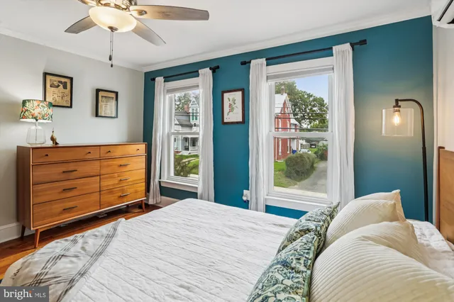 a kitchen with stainless steel appliances kitchen island granite countertop a refrigerator and a stove top oven