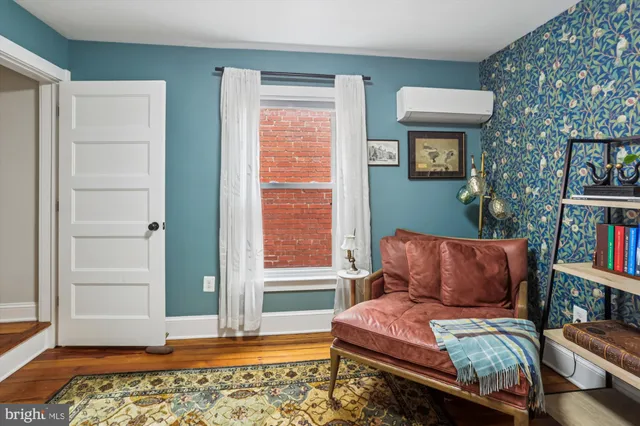 a workspace with furniture and window