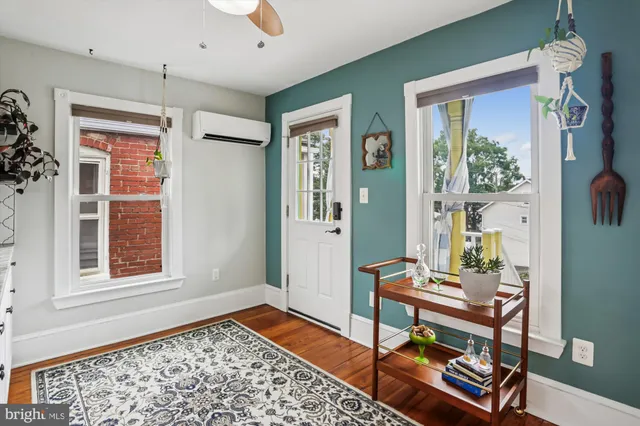 a view of a car parked in front of a house