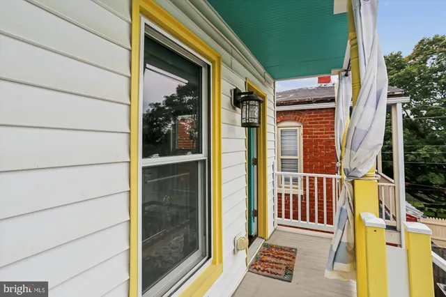 a picture of a bench in front of a mirror