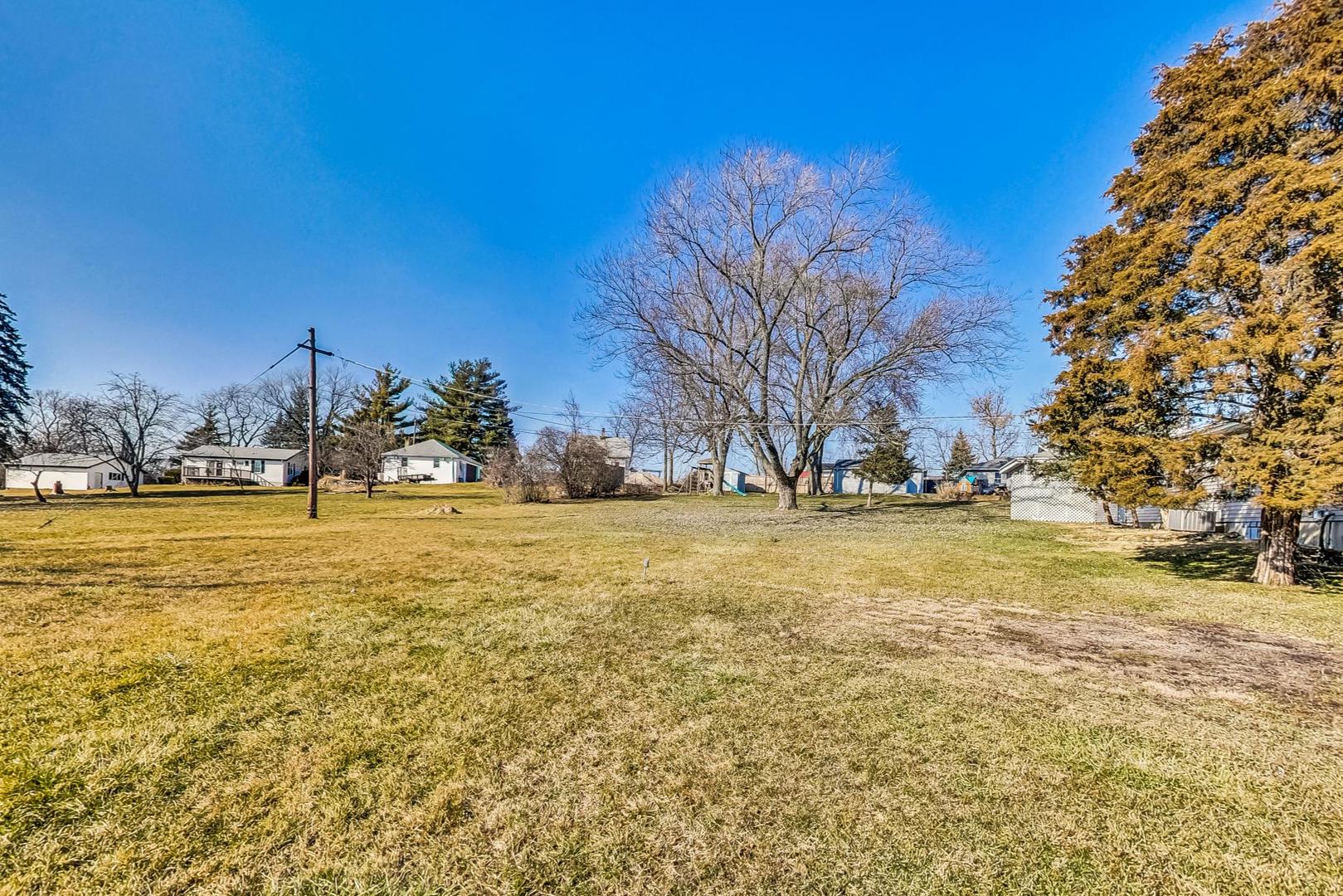 10S462 Ruth Drive Lemont, IL 60439 - Photo 22 of 24 a view of yard with swimming pool and trees