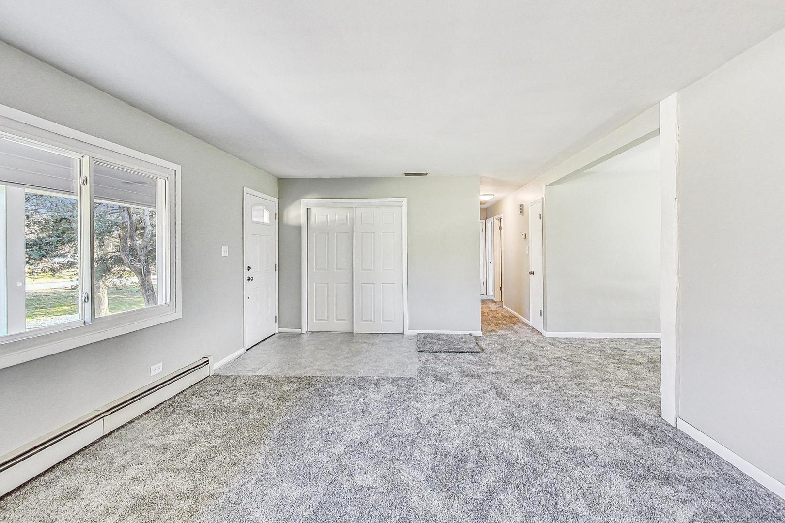 10S462 Ruth Drive Lemont, IL 60439 - Photo 3 of 24 an empty room with windows