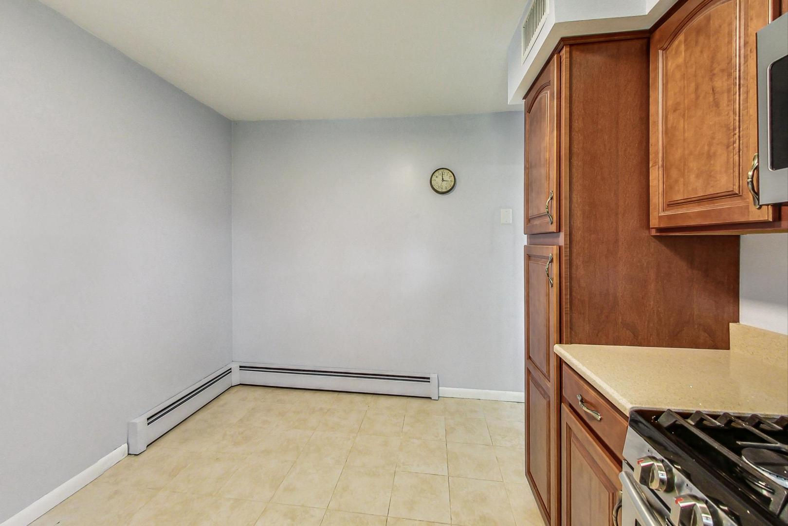 10S462 Ruth Drive Lemont, IL 60439 - Photo 9 of 24 a view of a kitchen cabinets and a stove top oven
