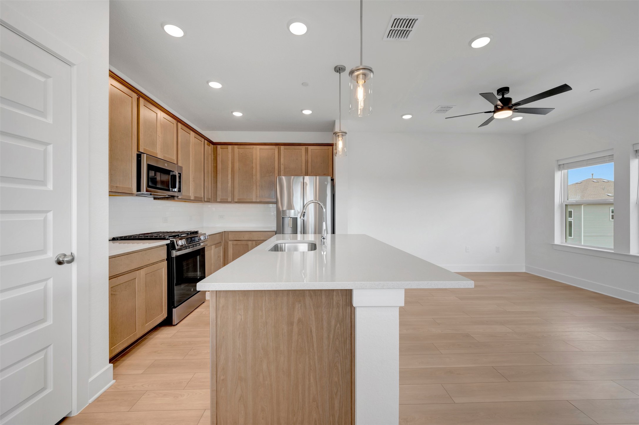 1010 A Brickell Loop Austin, TX 78744 - Photo 5 of 28 Kitchen - Family Room