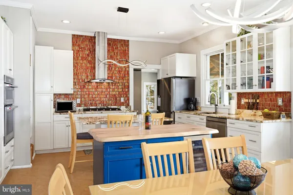 a workspace with furniture hardwood and a window