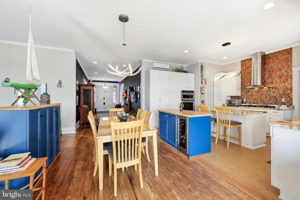a bathroom with a granite countertop sink a bathtub and shower