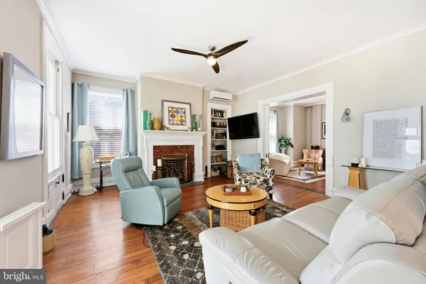 a bedroom with a bed and a fireplace