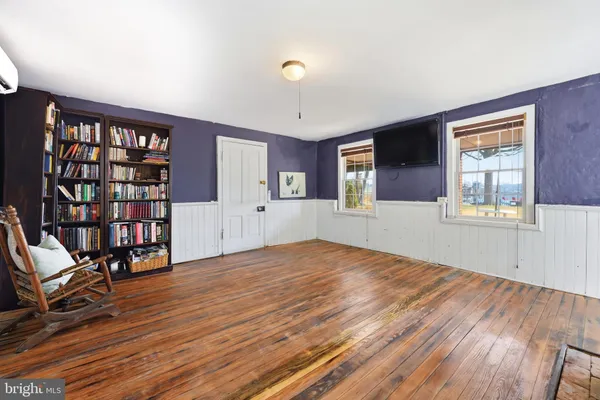a bathroom with a sink and a window