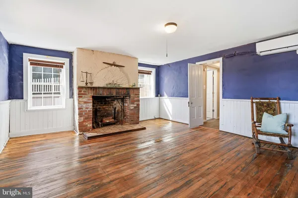 a bathroom with a tub and shower
