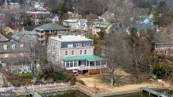 a kitchen with a stove a sink and a refrigerator