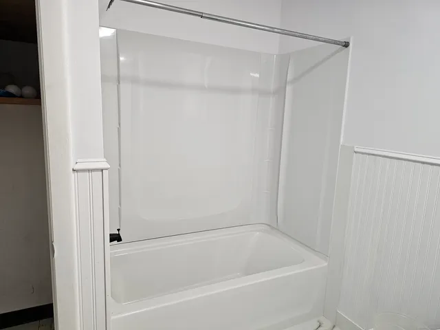 a bathroom with a bathtub