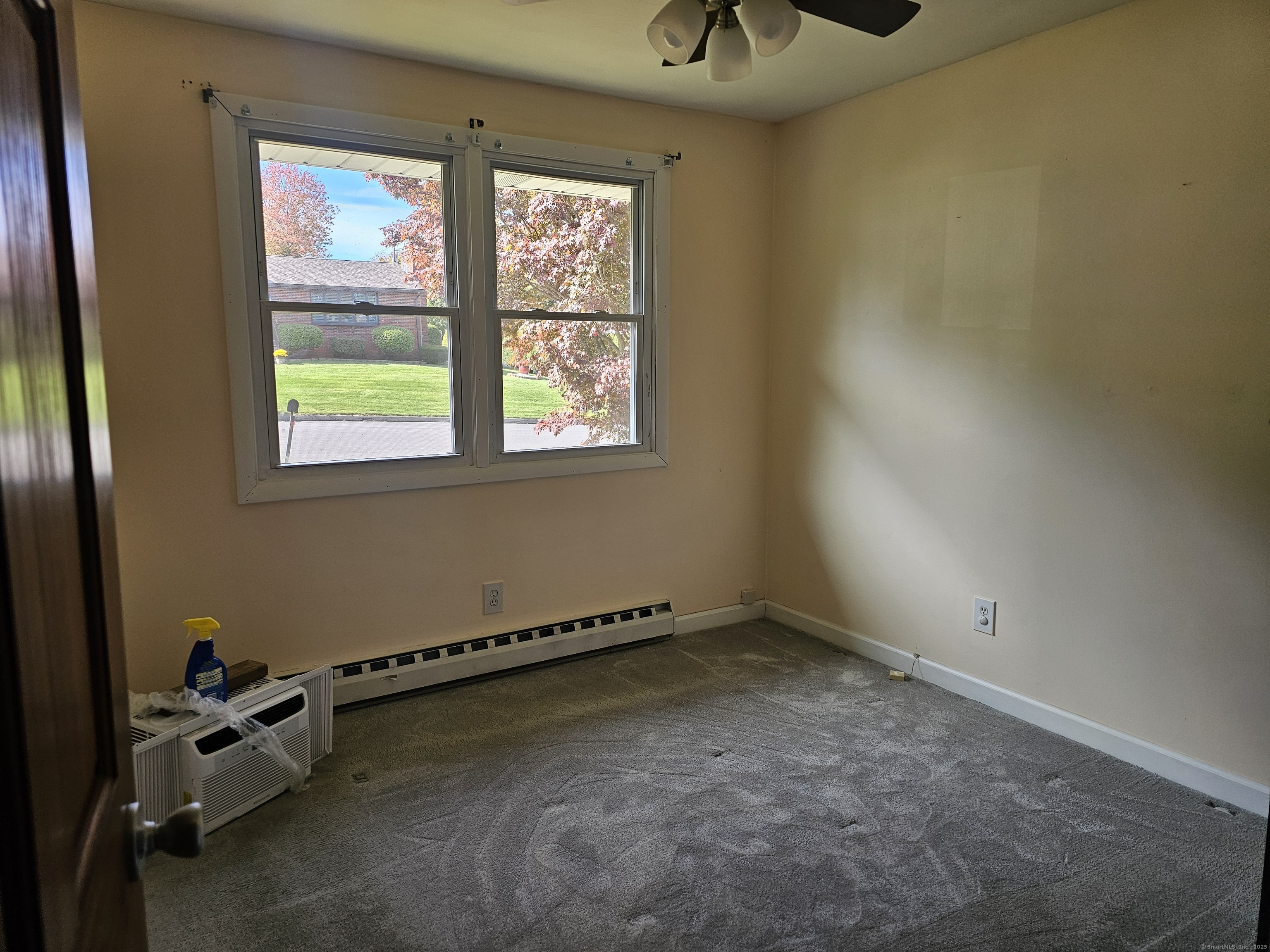 222 Crest Street Waterbury, CT 06708 - Photo 9 of 15 an empty room with a window