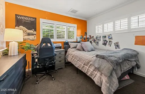 a bathroom with a sink and a window