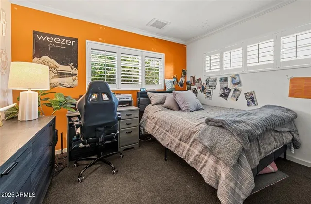 a bathroom with a sink and a window