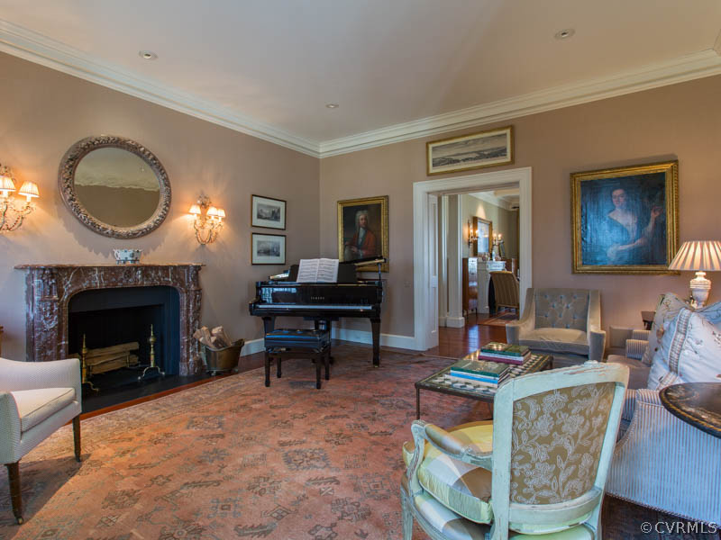 2575 Ridge Road Charlottesville, VA 22901 - Photo 4 of 24 a living room with furniture a window and a fireplace