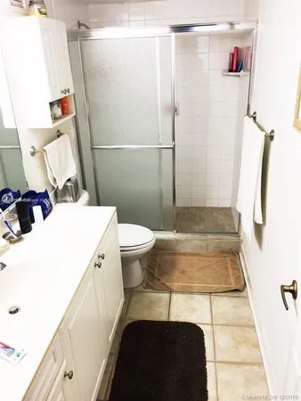 a bathroom with a sink and a shower